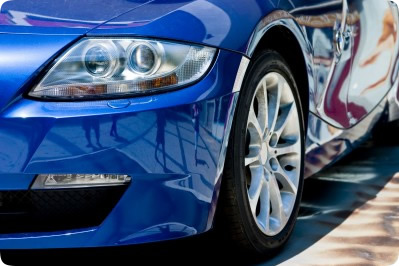 Blue car parked in well lit area